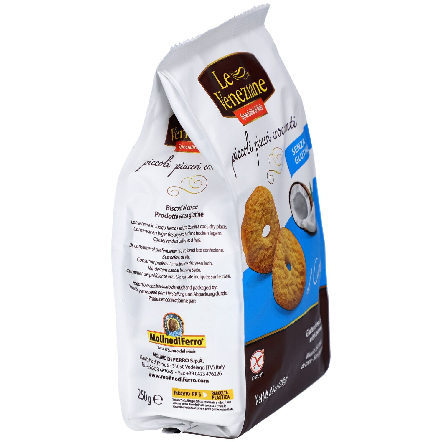 Vue en biais du paquet de biscuits LE VENEZIANE à la noix de coco. Montre des informations et le logo. Sans gluten.