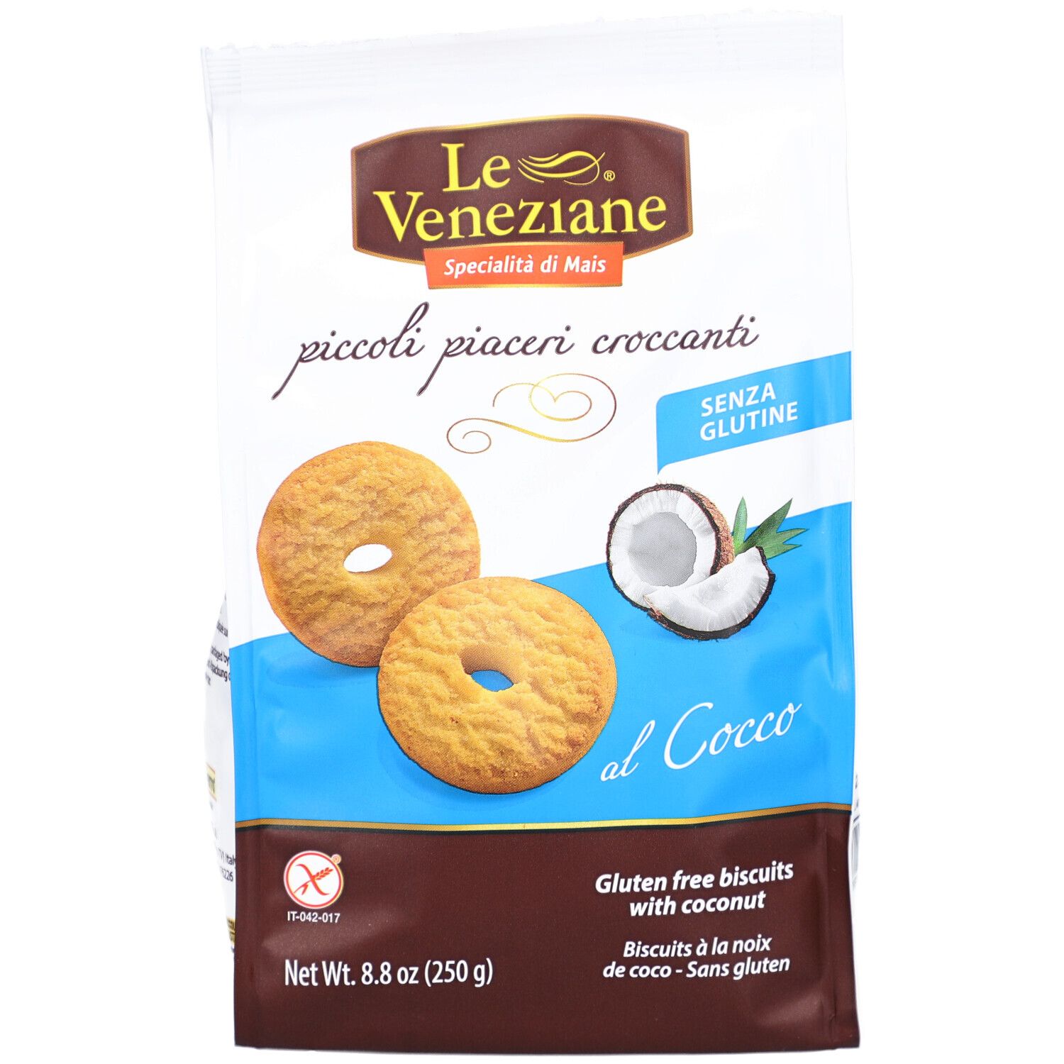 Paquet de biscuits LE VENEZIANE à la noix de coco. Montre des biscuits, une moitié de noix de coco et des informations. Sans gluten.