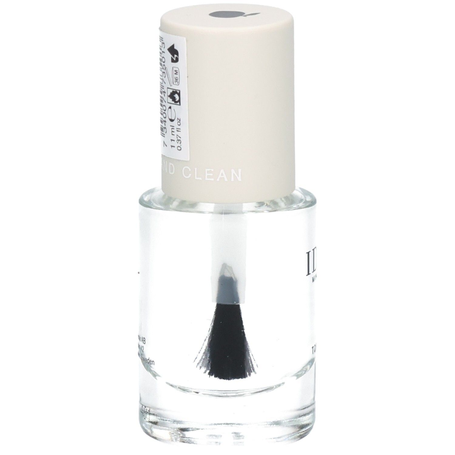 Flacon de vernis à ongles avec bouchon blanc. Inscription : IDUN Minerals. Pinceau visible. Étiquette avec informations.