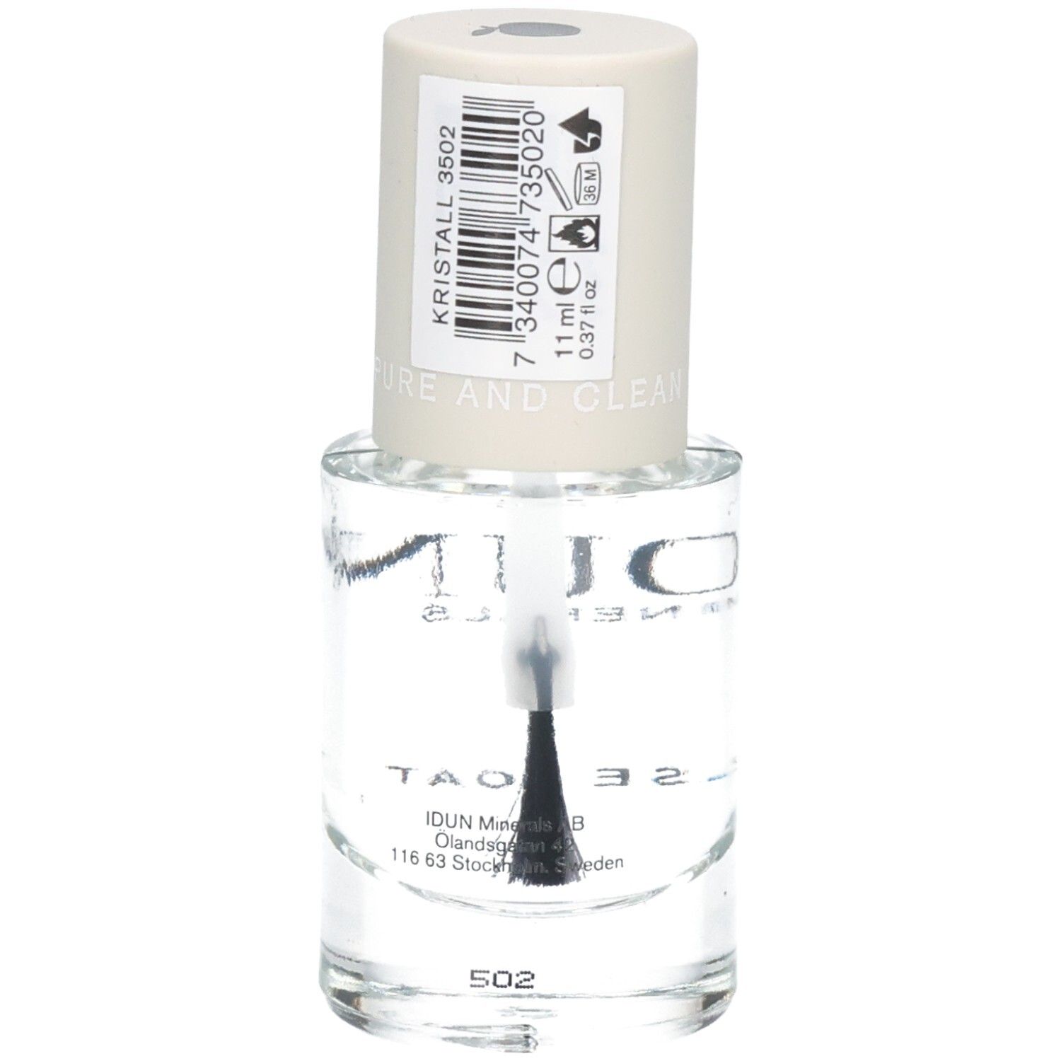 Klare Nagellackflasche mit schwarzem Pinsel. Aufschrift: Kristall 3502, 11 ml.