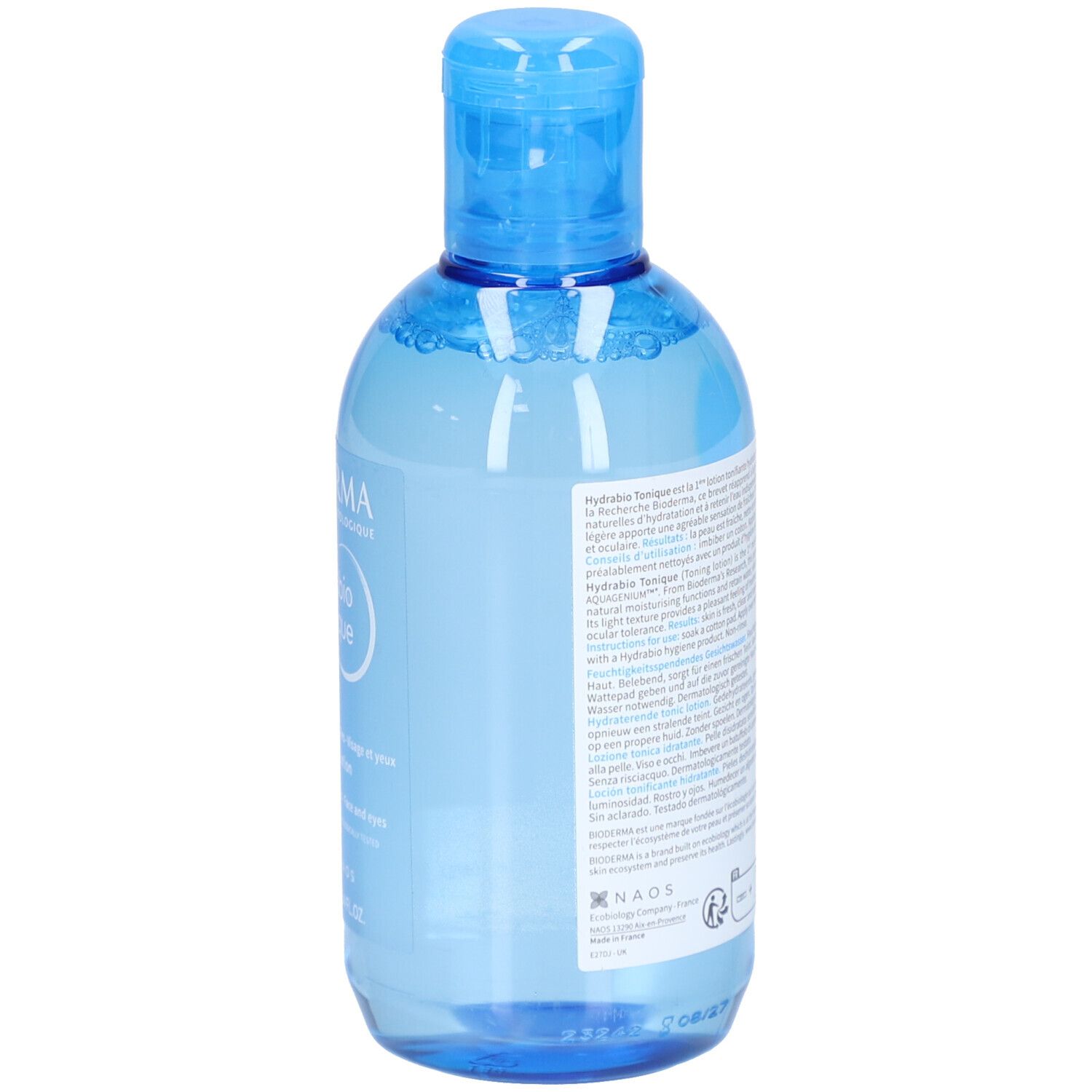 Dos du flacon bleu. Texte multilingue. Liquide transparent visible. Logo NAOS.