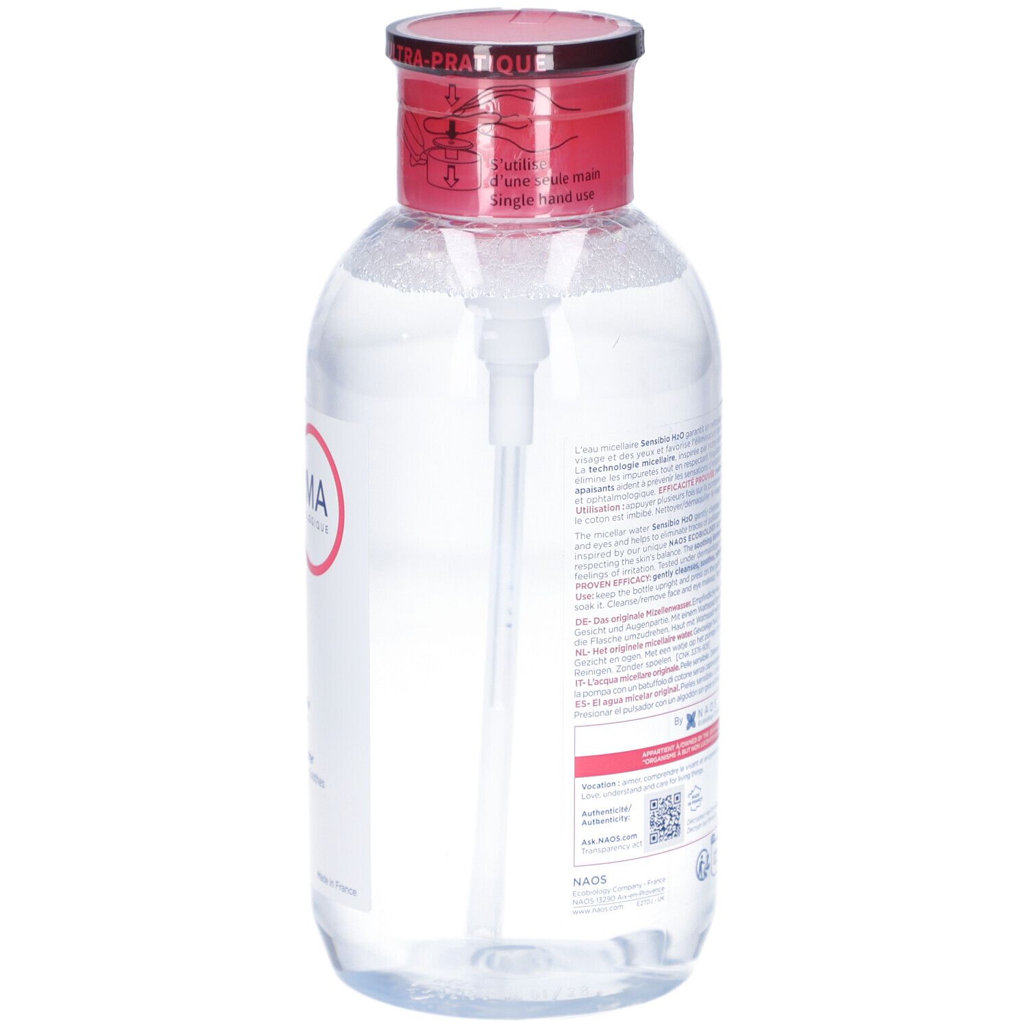 Durchsichtige Flasche mit rotem Deckel und weißer Pumpe. Rückseite mit Text. Produkt: Mizellares Reinigungswasser.