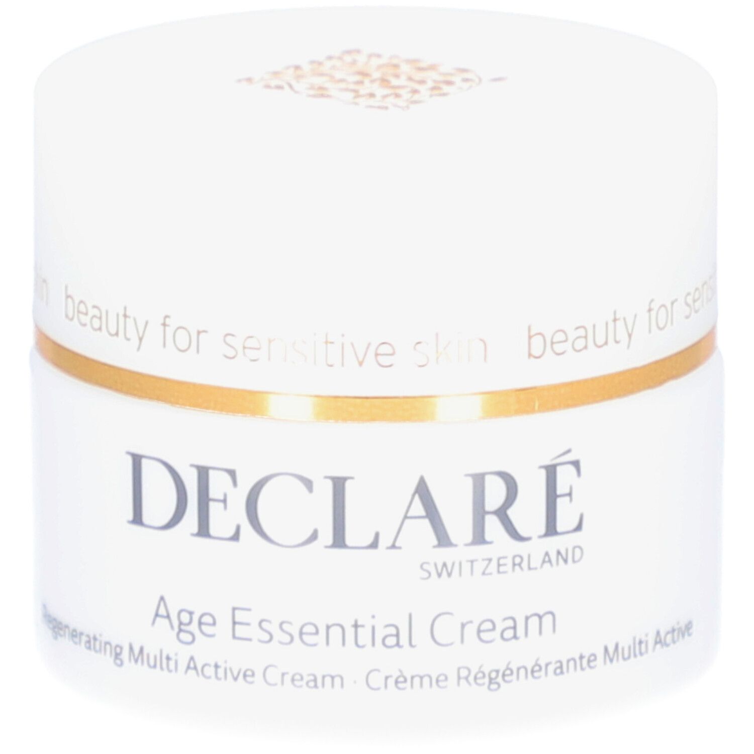 Pot blanc avec anneau doré. Inscription : DECLARÉ, Age Essential Cream. Pour peaux sensibles.