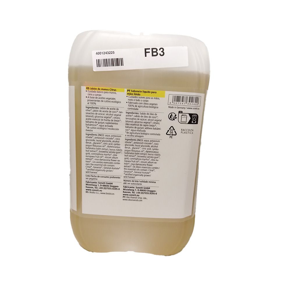 Bidon de liquide jaunâtre. Couvercle blanc. Étiquette avec code-barres et informations sur le produit.