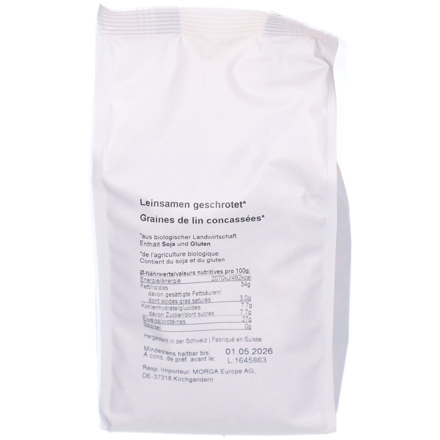 Dos du sachet de graines de lin concassées. Texte : "Leinsamen geschrotet", informations sur l'agriculture biologique, valeurs nutritionnelles et date limite.