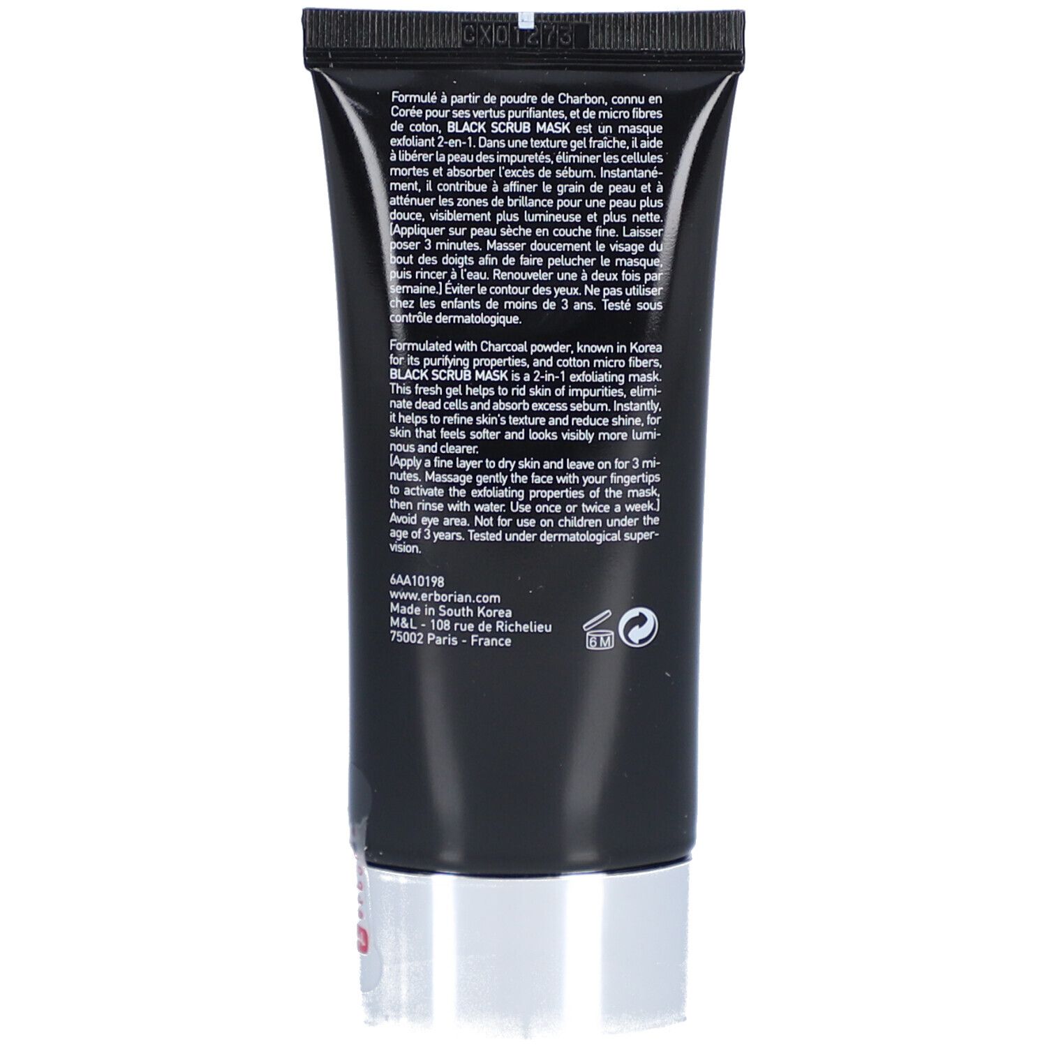 Rückseite der schwarzen Tube. Text in mehreren Sprachen. Silberner Deckel.