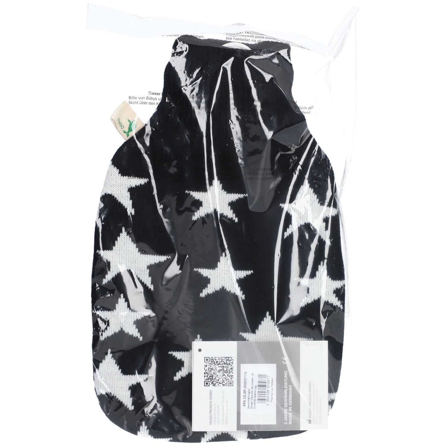 Schwarze Wärmflasche mit weißen Sternen in transparenter Verpackung. Produktetikett unten rechts.