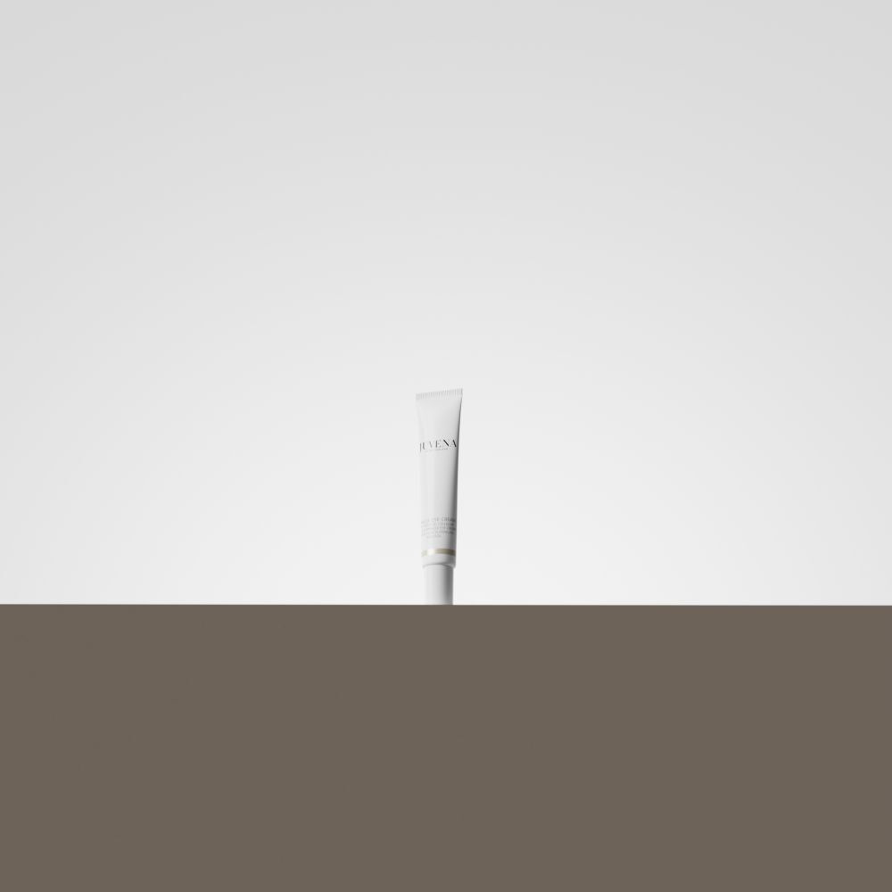 Tube blanc sur fond clair. Inscription illisible.