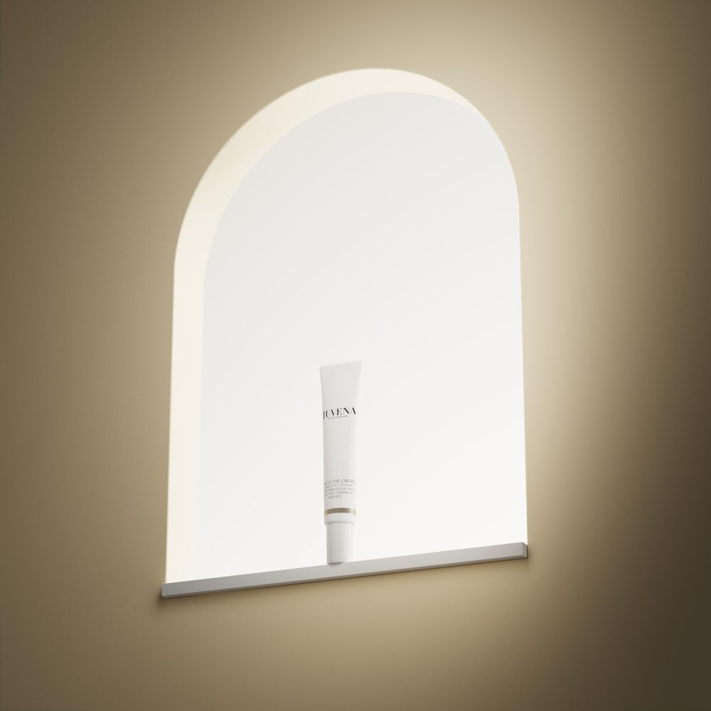 Tube blanc dans une niche. Inscription: JUVENA. Nom du produit illisible.