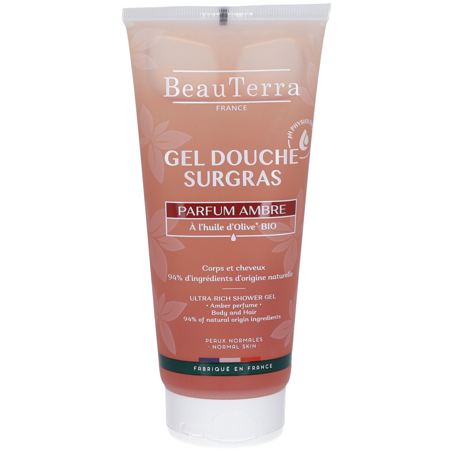 Tube beige de gel douche. Inscriptions: "BeauTerra", "Gel Douche Surgras", "Parfum Ambre", et "À l'huile d'Olive BIO".