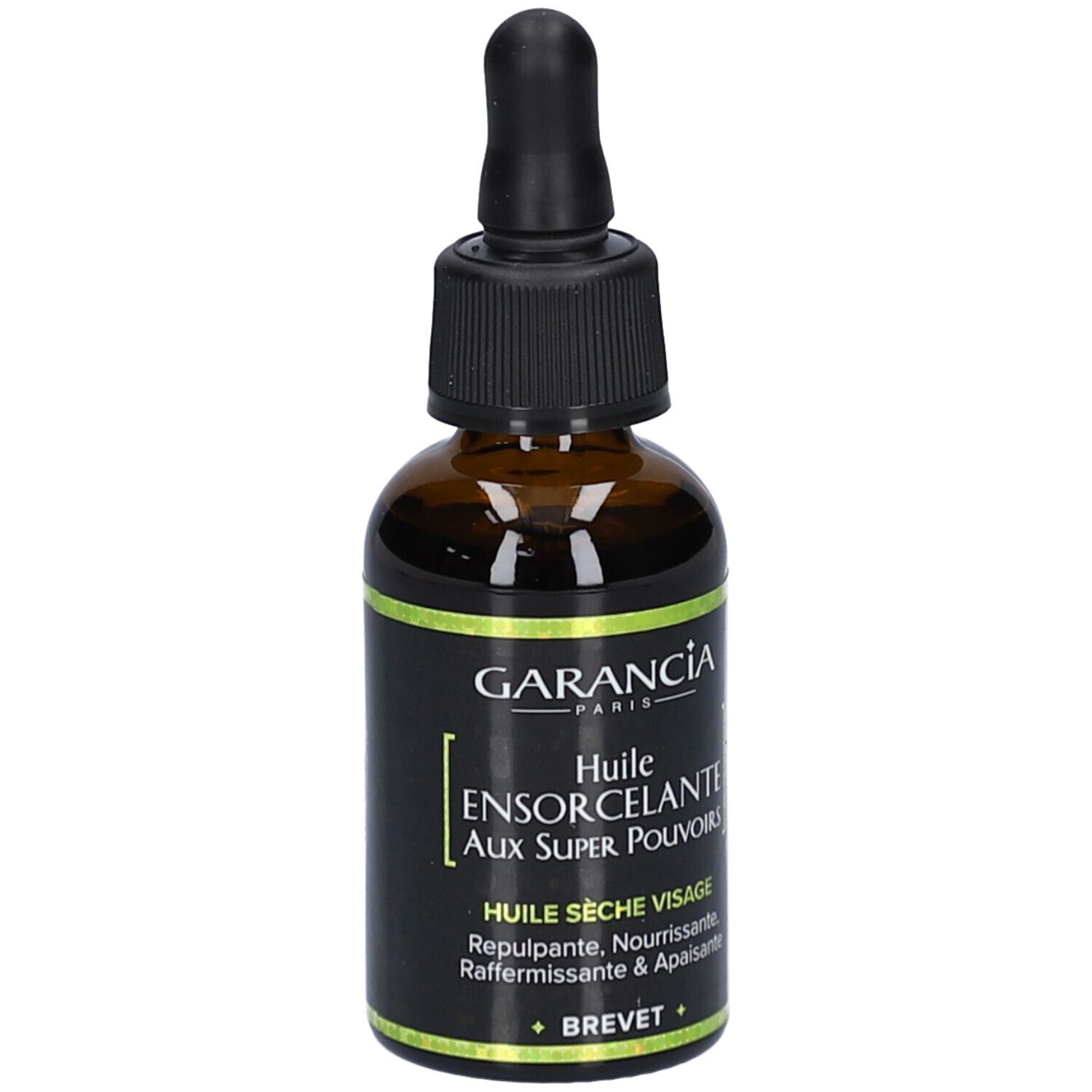 Braune Glasflasche mit schwarzem Deckel und Pipette. Aufschrift: GARANCIA, Huile Ensorcelante aux Super Pouvoirs.