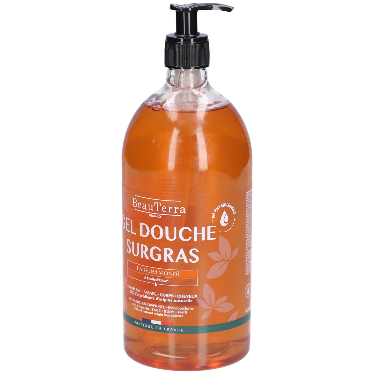Transparente Flasche mit braunem Duschgel. Schwarzer Spender. Aufschrift: BeauTerra, Gel Douche Surgras, Parfum Monoï.