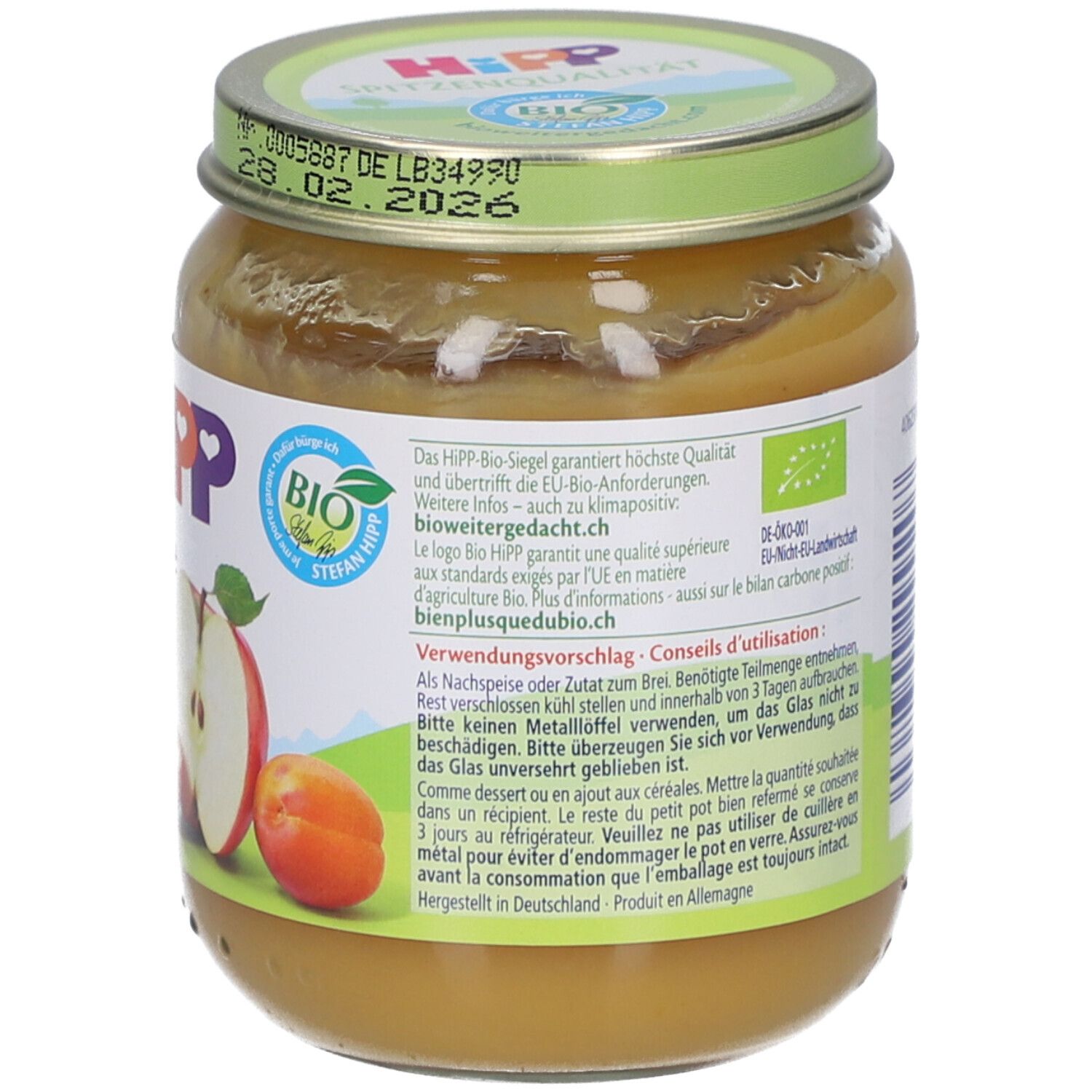 Rückseite des Glases mit HiPP Bio-Apfel-Aprikosen-Püree. Enthält Informationen, Bio-Siegel und Haltbarkeitsdatum. 125g.