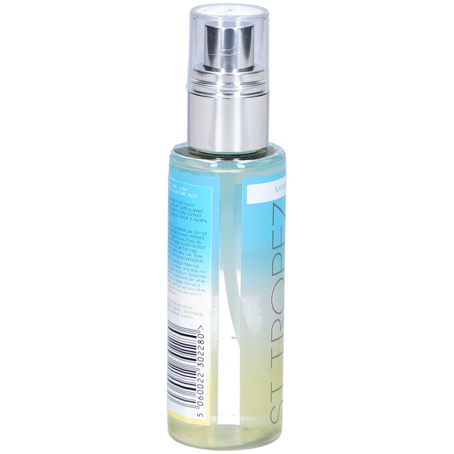 Rückseite der Flasche. Etikett mit Produktinformationen und Barcode. Aufschrift: ST. TROPEZ. Flasche mit Zerstäuber.