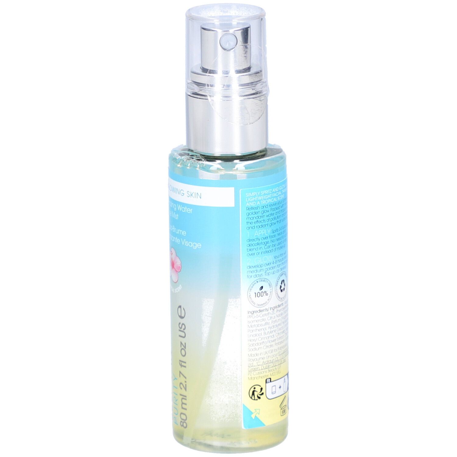 Rückseite der Flasche. Etikett mit Produktinformationen. Aufschrift: ST. TROPEZ. Flasche mit Zerstäuber.