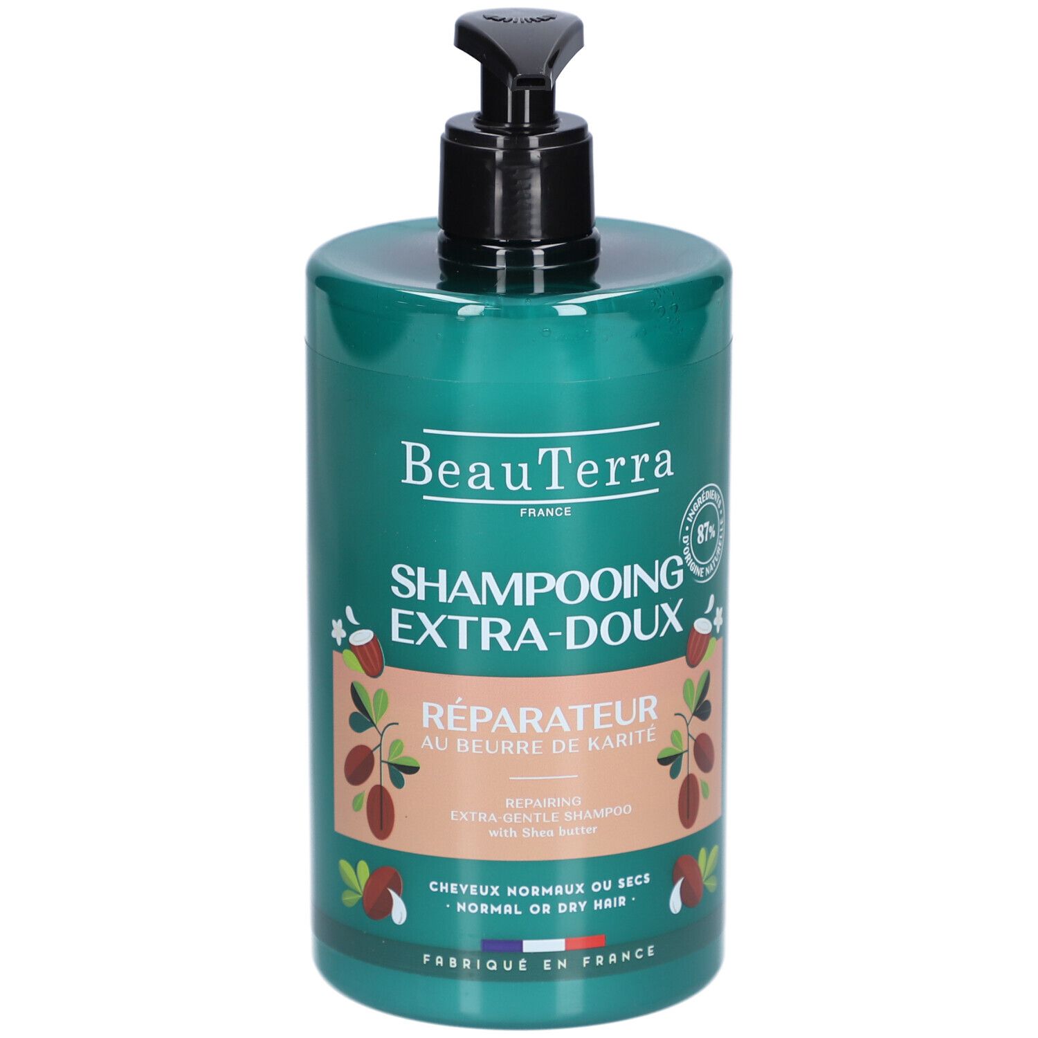 Flacon de shampooing vert avec pompe noire. Inscriptions: BeauTerra, Shampooing Extra-Doux, Réparateur au beurre de Karité. Pour cheveux normaux ou secs.