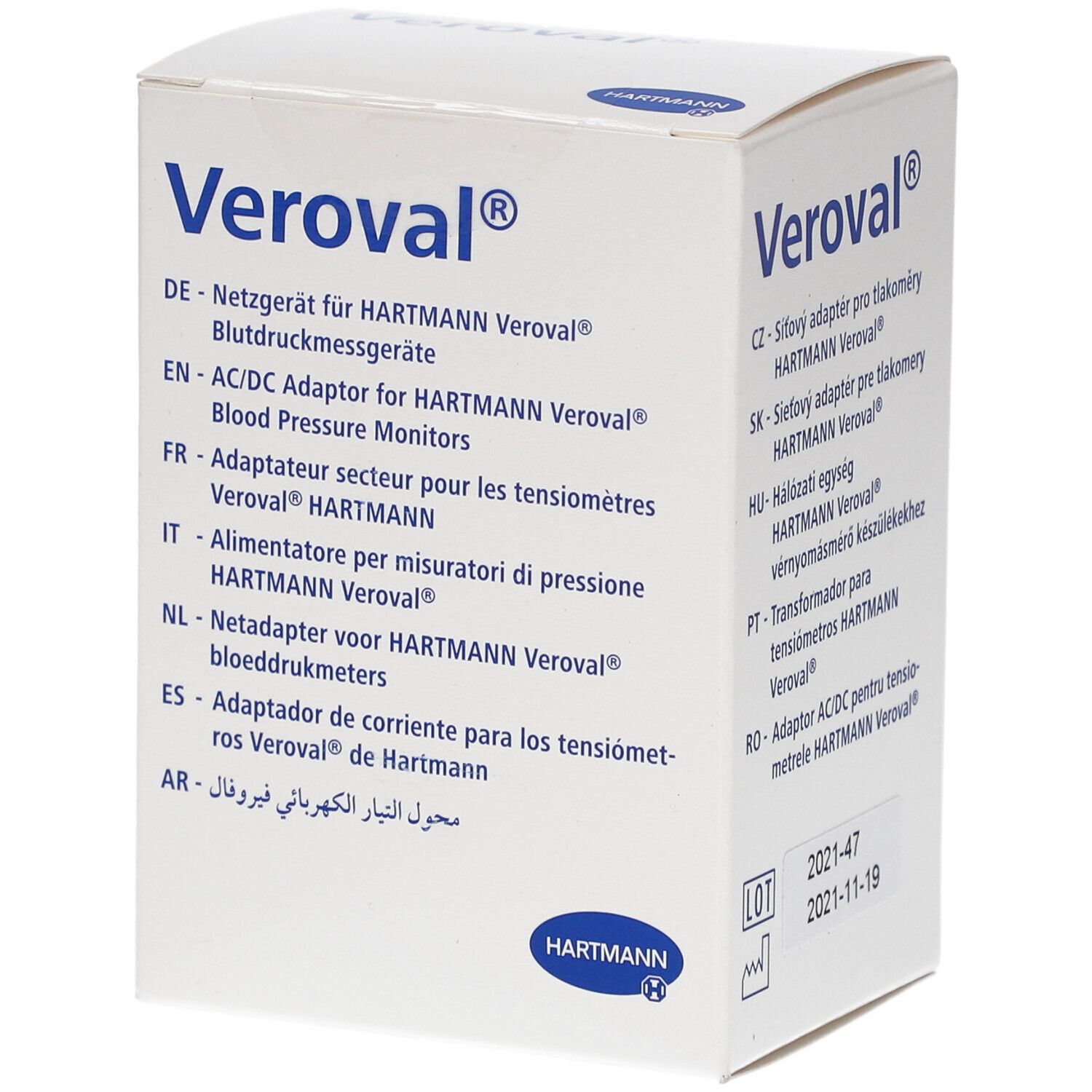 Veroval AC/DC Adapter-Verpackung. Text in Deutsch, Englisch, Französisch, Italienisch, Niederländisch, Spanisch und Arabisch. Hartmann-Logo.