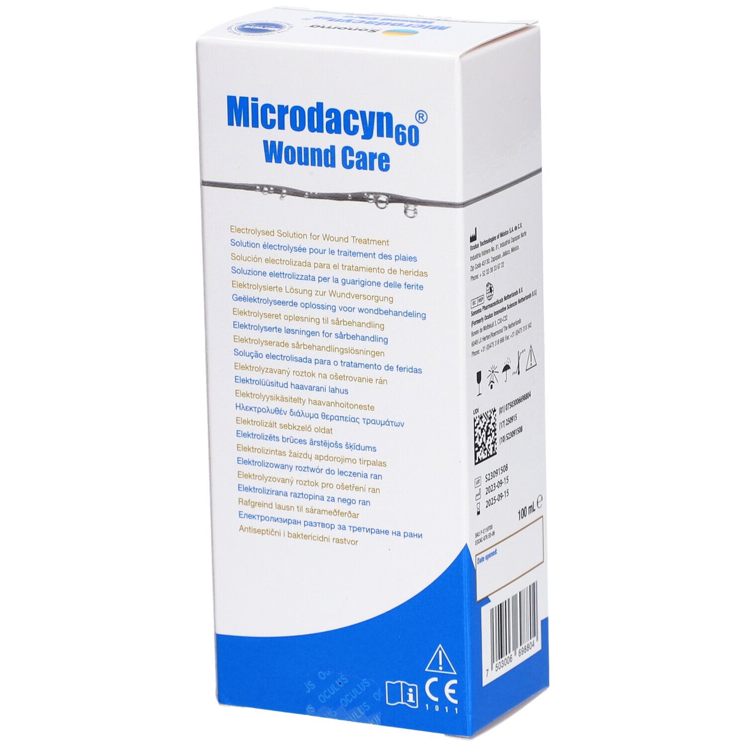 Emballage blanc avec accents bleus. Inscription: Microdacyn60 Wound Care. Contient des informations en plusieurs langues.
