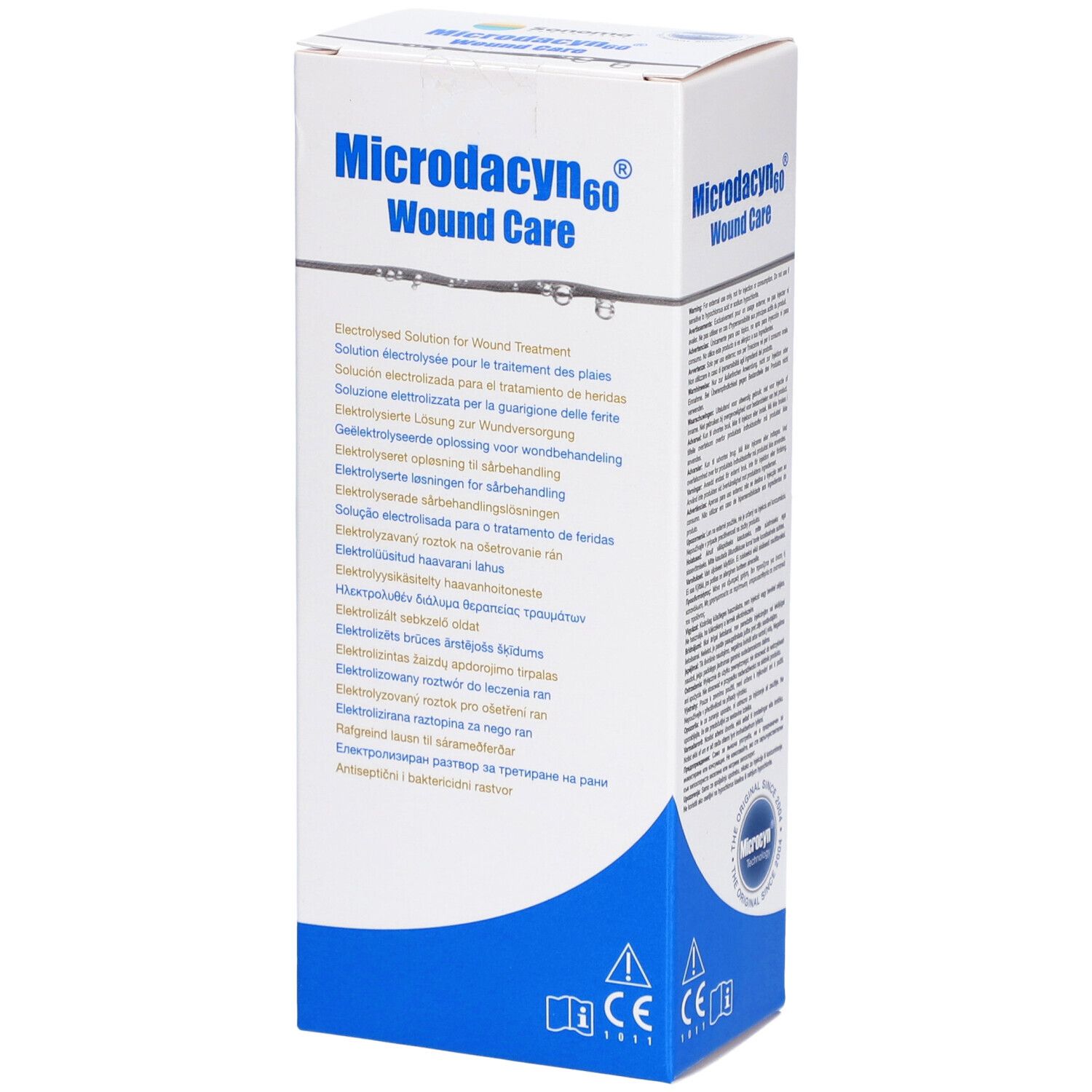 Emballage blanc avec texte. Inscription: Microdacyn60 Wound Care. Contient des informations en plusieurs langues et le logo.