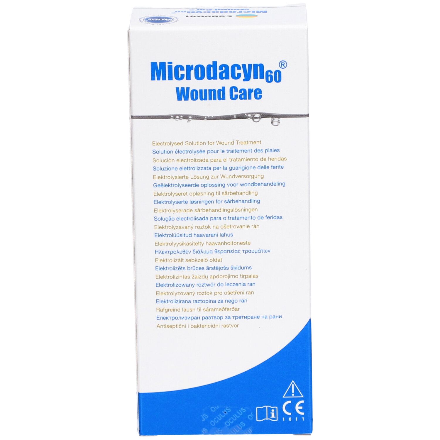 Emballage blanc avec texte. Inscription: Microdacyn60 Wound Care. Contient des informations en plusieurs langues.