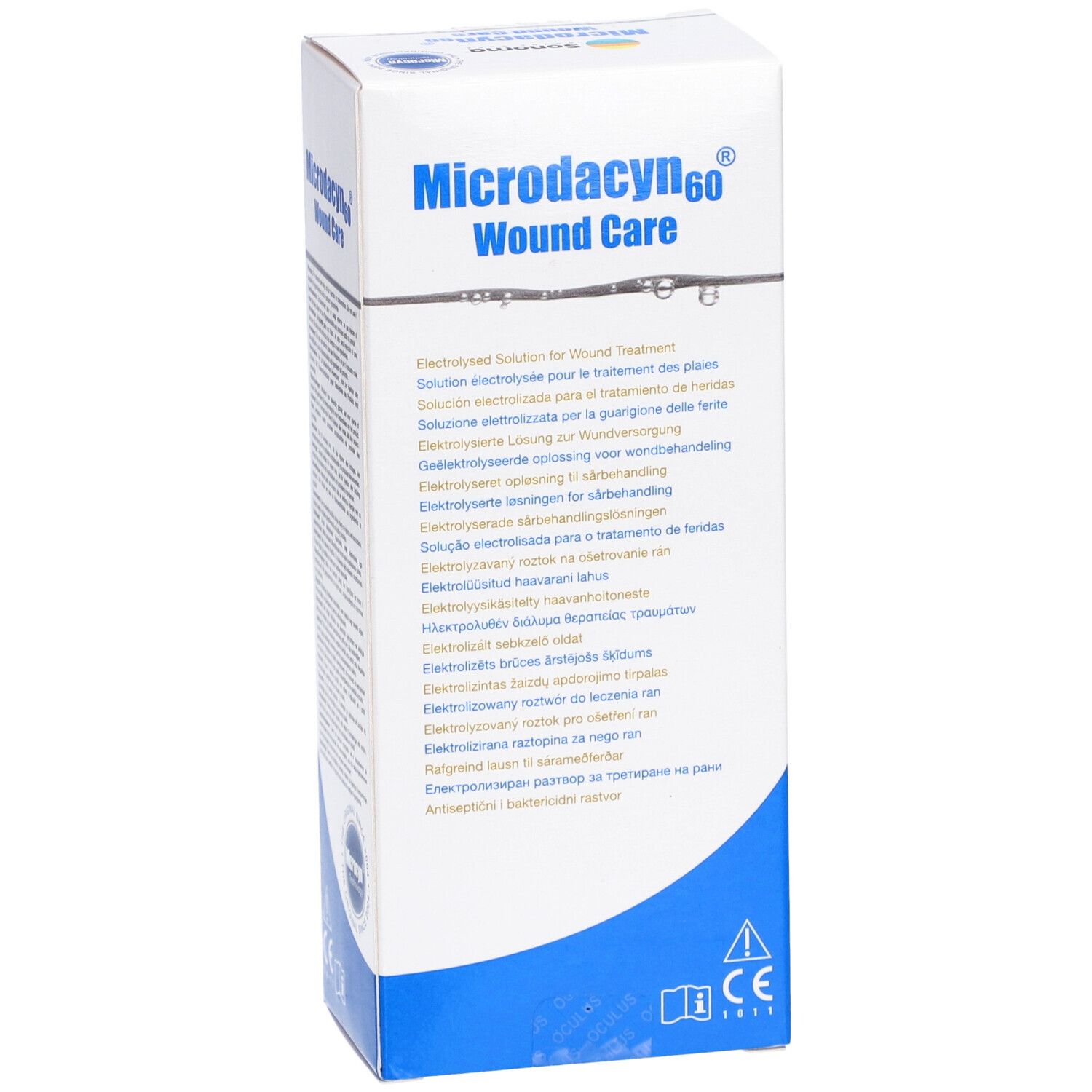 Emballage blanc avec texte. Inscription: Microdacyn60 Wound Care. Contient des informations en plusieurs langues.