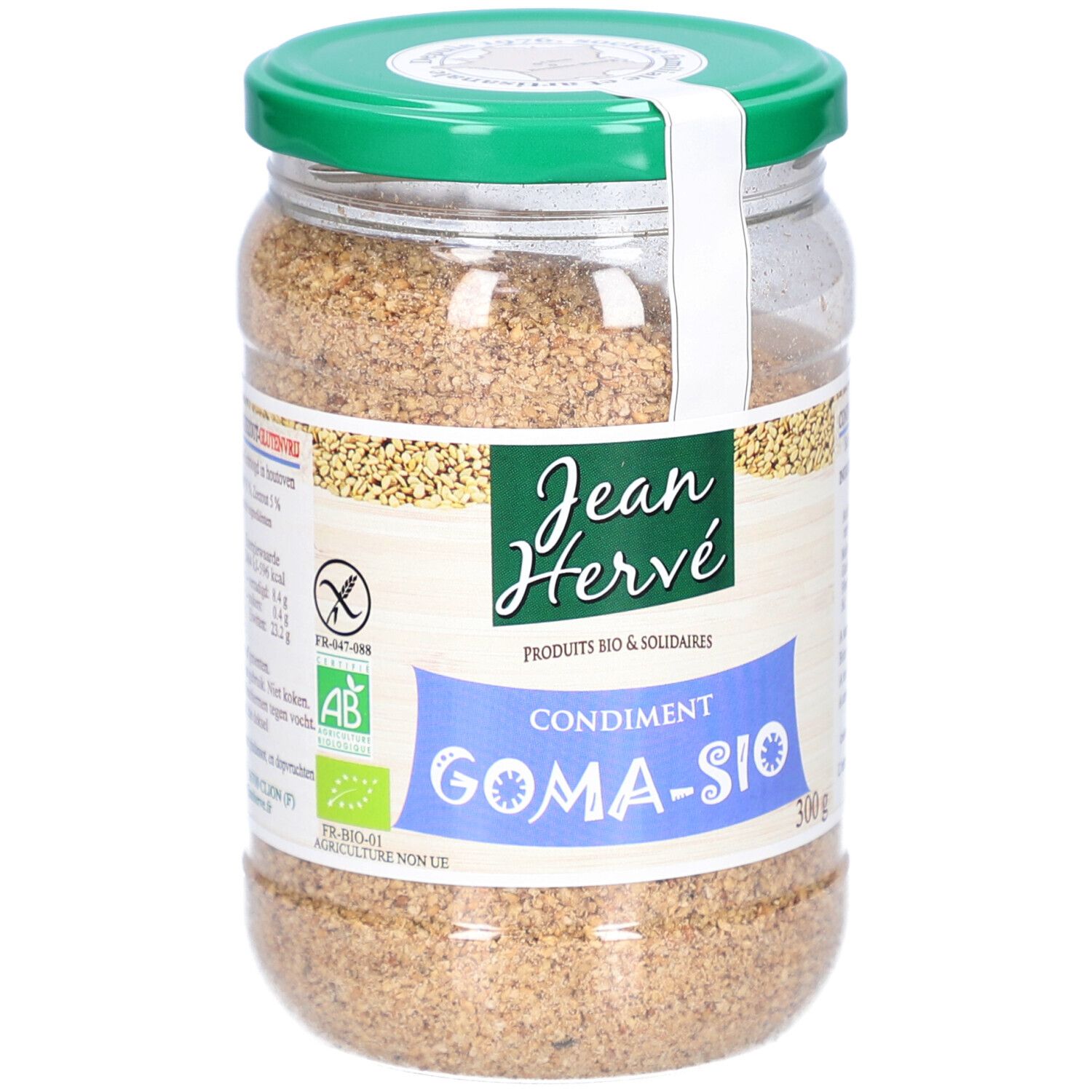 Gomasio-Glas. Grüner Deckel, weißes Etikett mit Logo und Text. Bio-Zertifizierung.