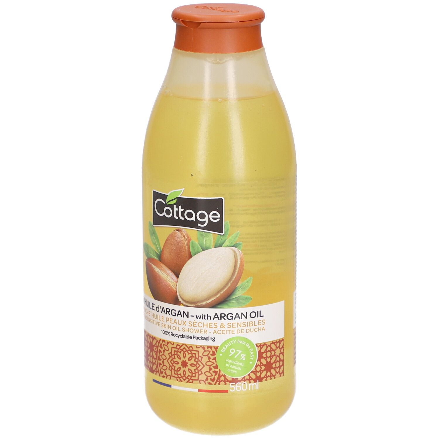 Flacon jaune avec bouchon orange. Inscription: Cottage, huile d'argan. Illustration d'argan. 97% recyclable. 560ml.