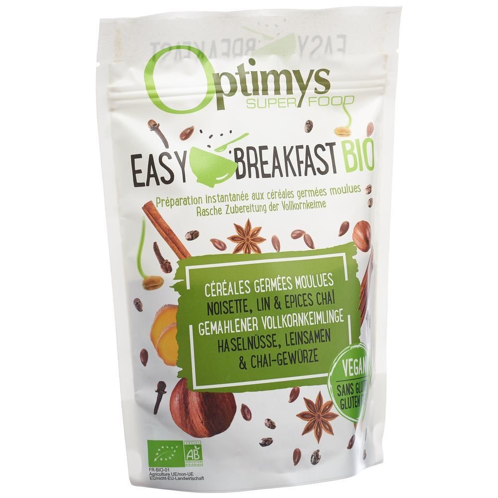Verpackung von Optimys Easy Breakfast Bio. Aufschrift: Easy Breakfast Bio, Getreide, Haselnuss, Leinsamen, Chai-Gewürze. Bio-Siegel.