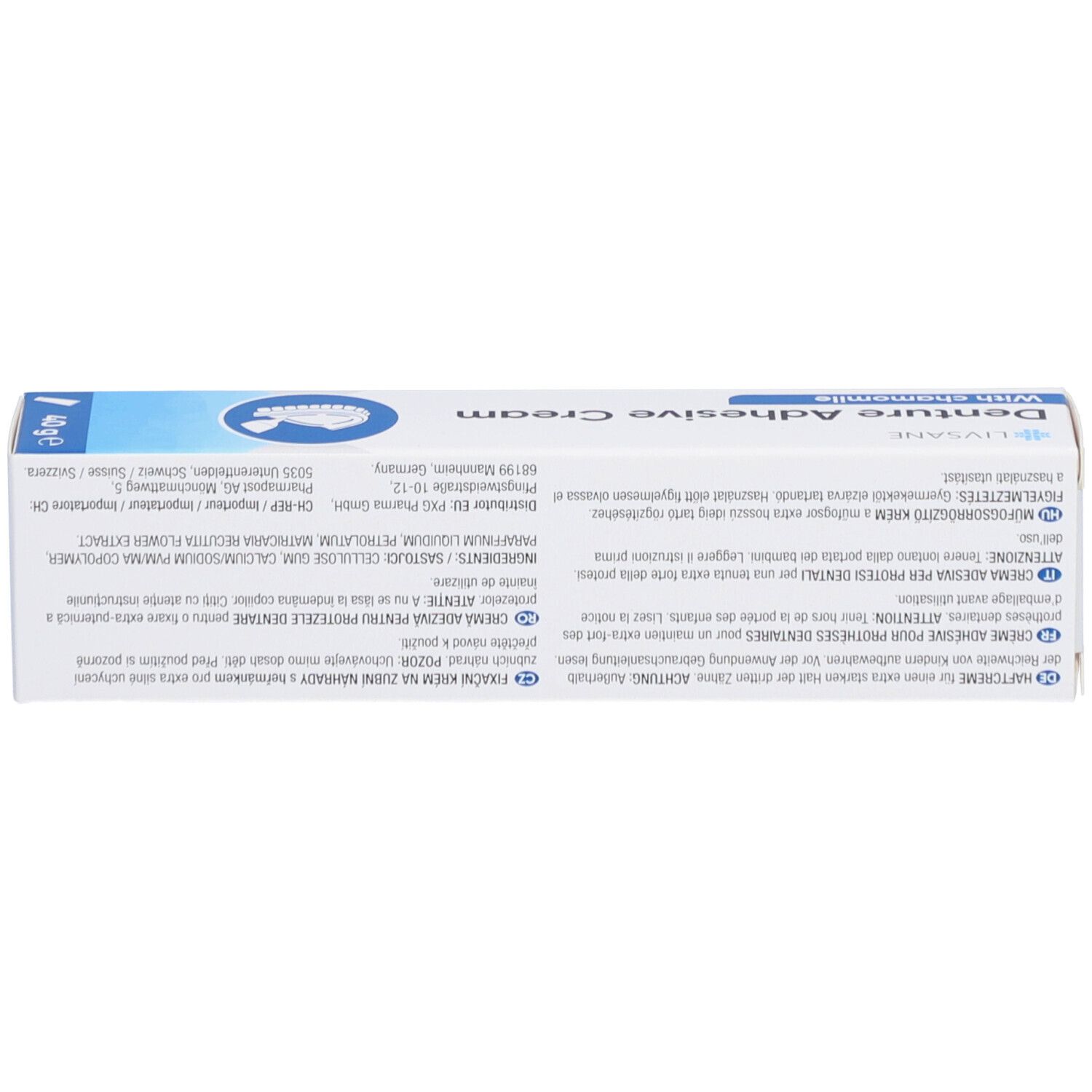 Rückseite der Schachtel mit Zahncreme. Text in mehreren Sprachen. Inhaltsstoffe, Herstellerinformationen, Chargennummer.