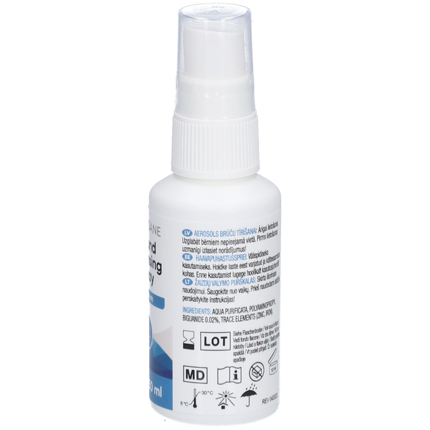 Flacon pulvérisateur blanc avec texte. Contient ingrédients et numéro de lot. Tête de pulvérisation.