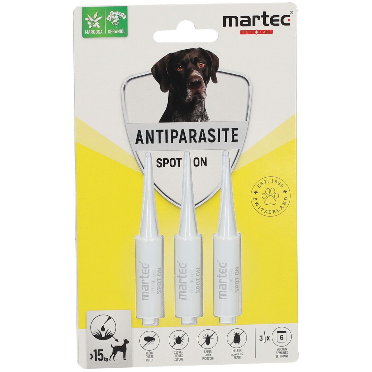 Emballage de trois pipettes spot-on. Nom du produit: MARTEC Antiparasitaire pour chiens >15kg. Contient une image de chien et des pictogrammes.