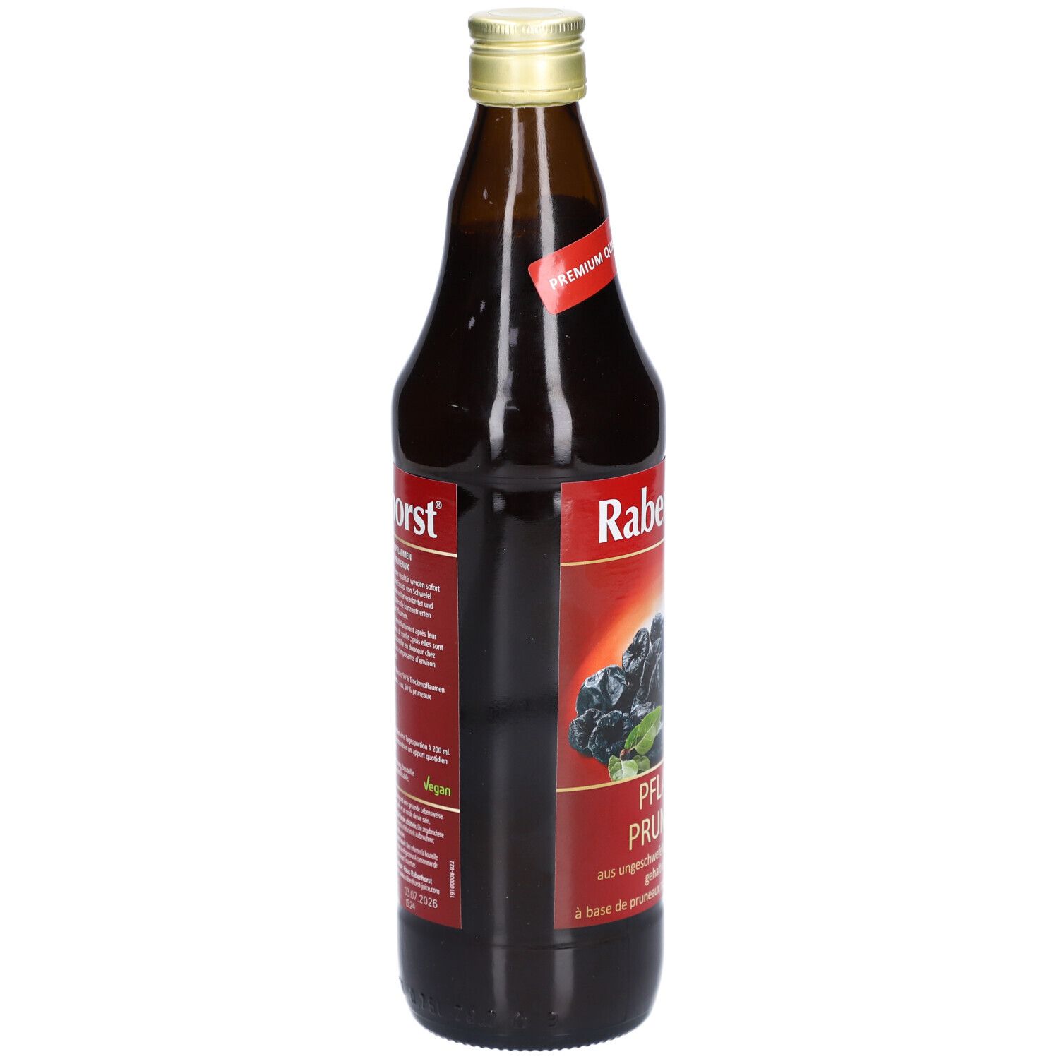 Braune Glasflasche mit goldfarbenem Deckel. Etikett mit Text und Pflaumen-Abbildung. Marke Rabenhorst.