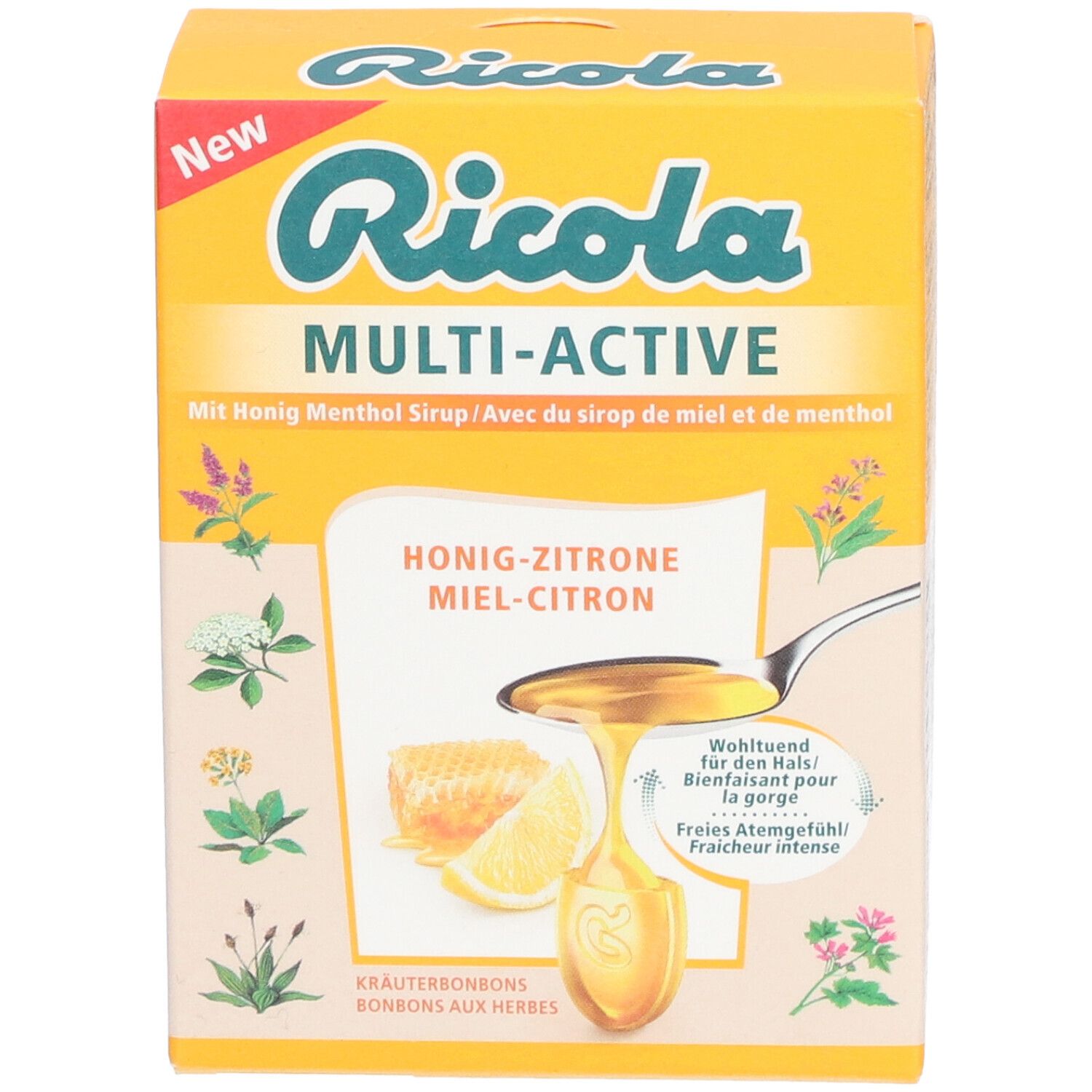 Gelbe Schachtel Ricola Multi-Active Honig-Zitrone. Aufschrift "New". Illustrationen von Kräutern und Honig.