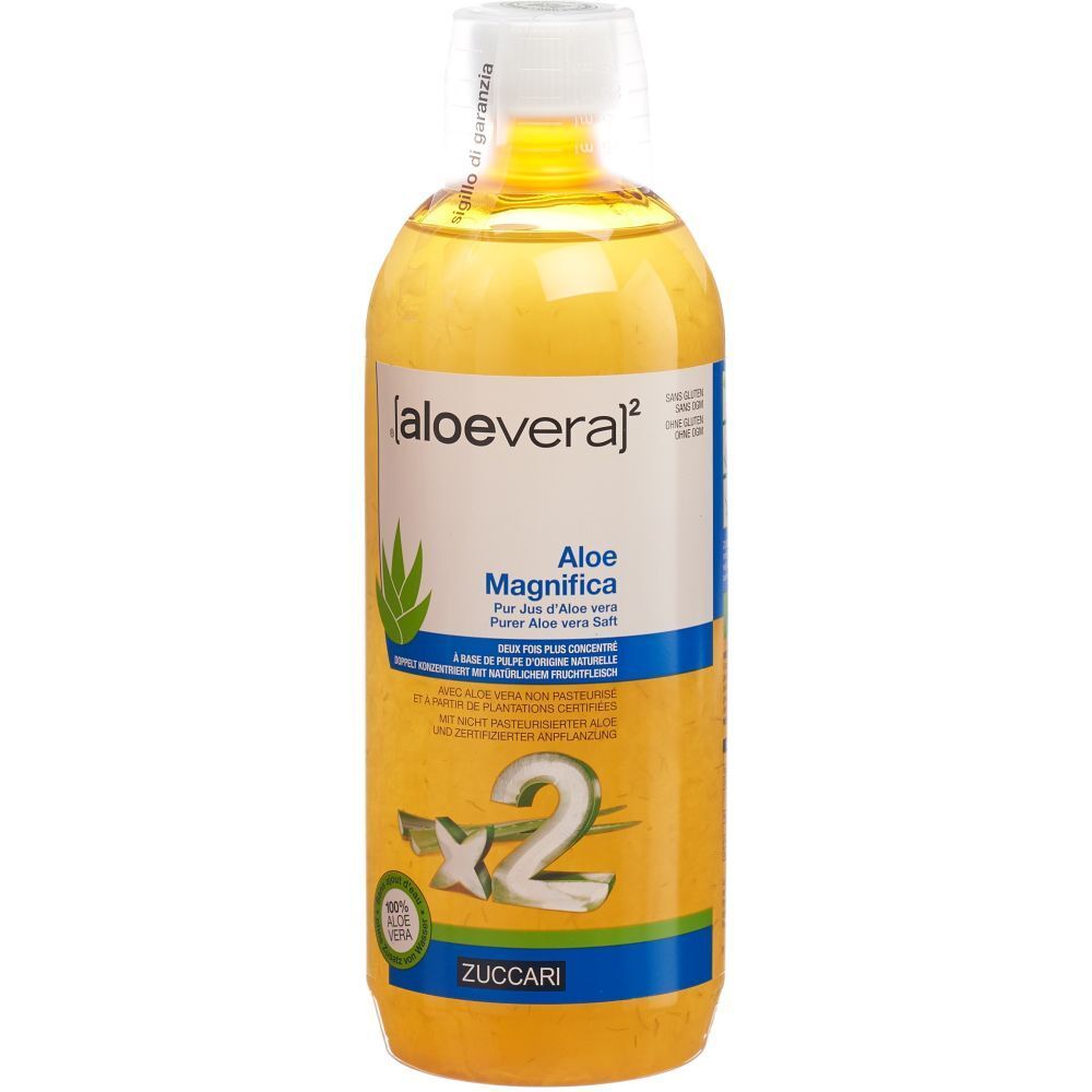 Gelbe Flasche mit Flüssigkeit. Aufschrift: [aloevera]² Aloe Magnifica, Zuccari. Grün-weißes Logo. Deckel mit weißem Verschluss.