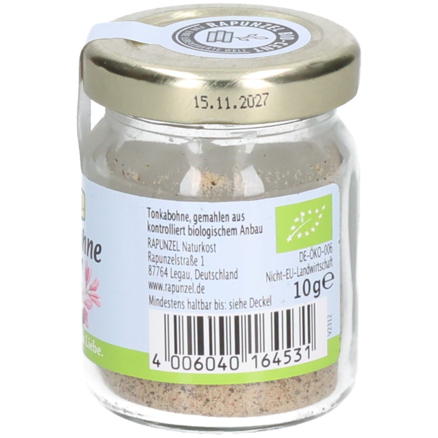 Pot de fèves tonka moulues. Dos avec texte, label bio, poids 10g et date de péremption. Couvercle doré.