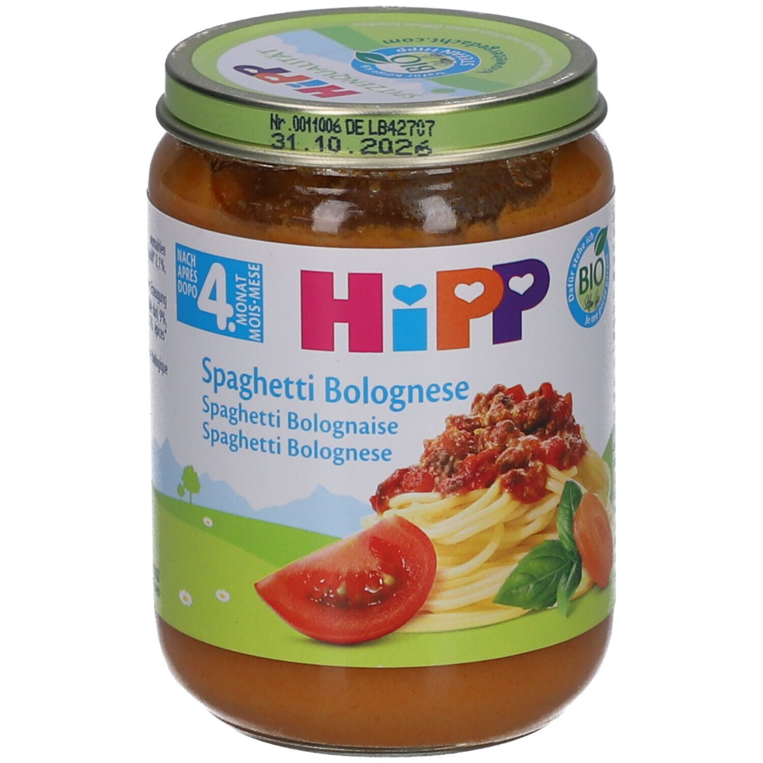 Glas mit HiPP Spaghetti Bolognese für Babys ab 4 Monaten. Bio-Siegel. Abbildung von Spaghetti Bolognese.
