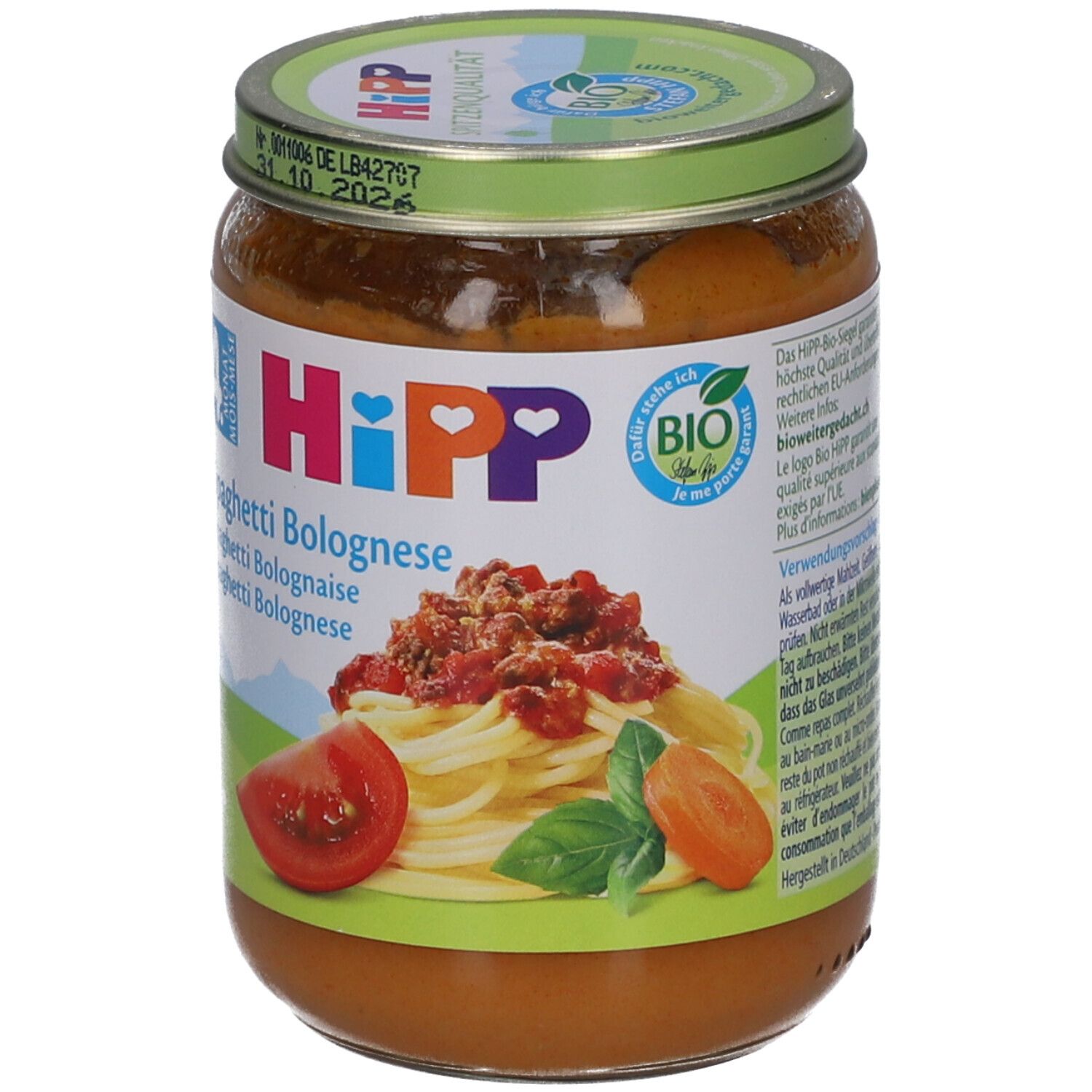 Glas mit HiPP Spaghetti Bolognese für Babys ab 4 Monaten. Bio-Siegel. Abbildung von Spaghetti Bolognese.