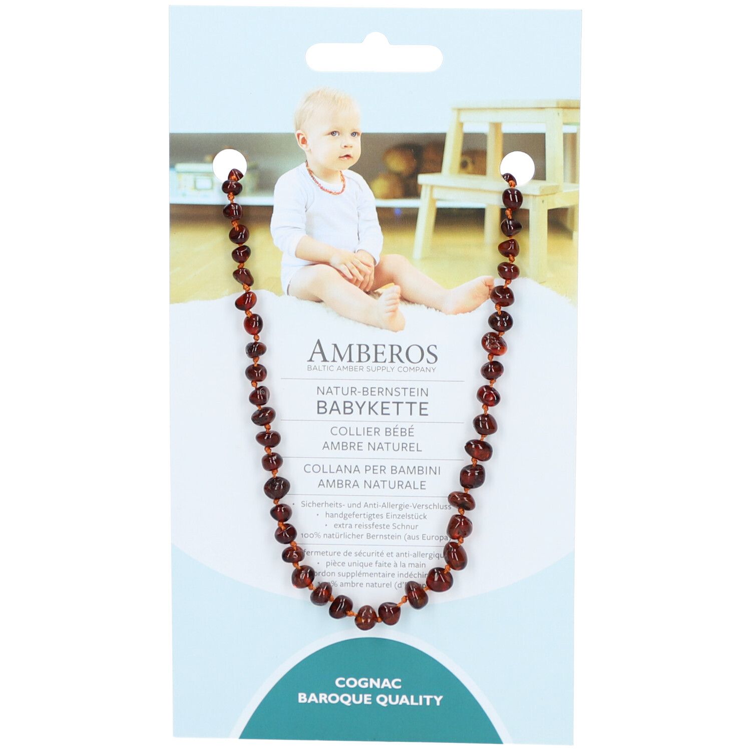 Collier bébé en ambre cognac, qualité baroque. Emballage avec photo de bébé et nom du produit.