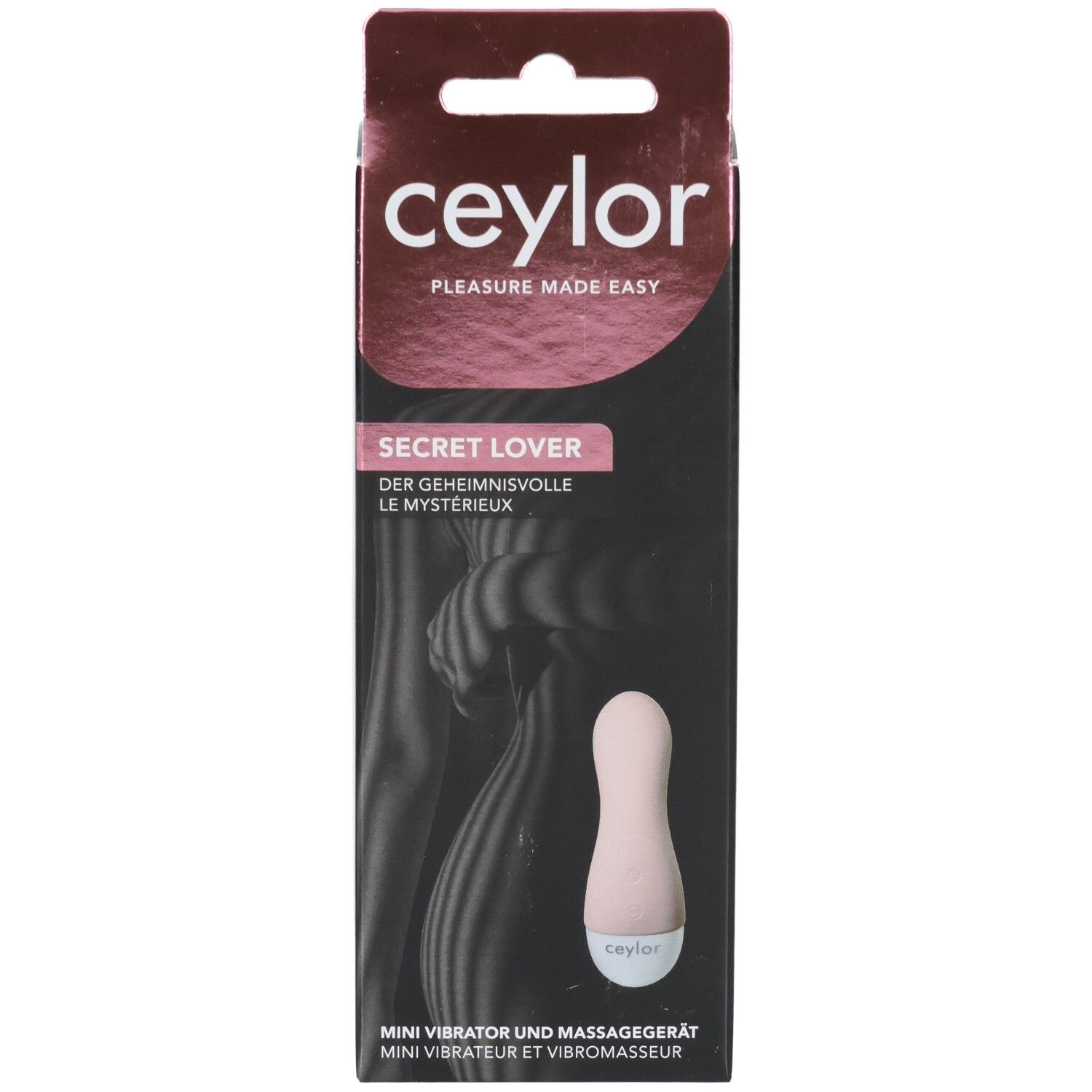 Verpackung mit Mini-Vibrator. Marke: CEYLOR. Text: Secret Lover. Rosa Vibrator, weißer Kopf. Mini Vibrator und Massagegerät.