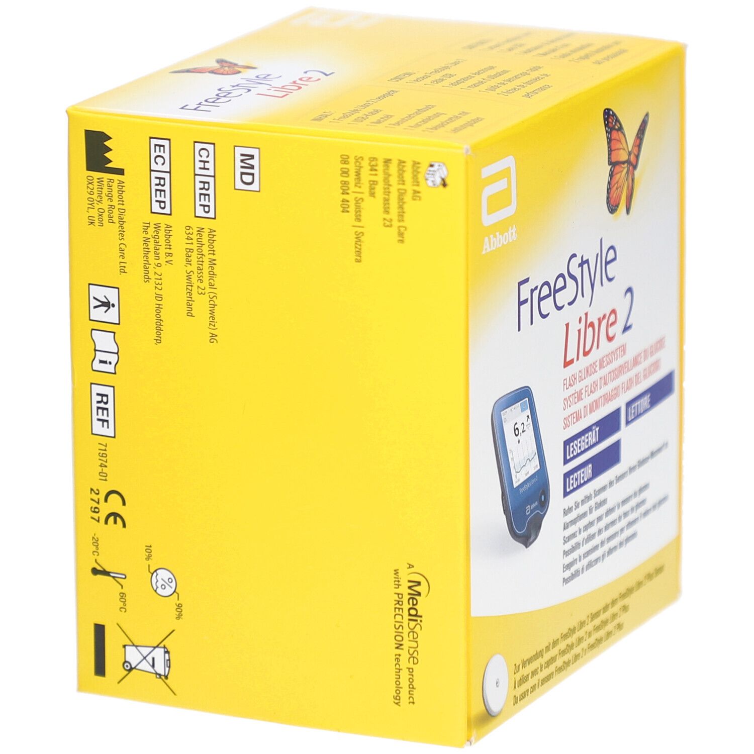 Boîte jaune, vue latérale. Inscription: FreeStyle Libre 2. Logo Abbott. Informations sur le produit et logos. Illustration de papillon.