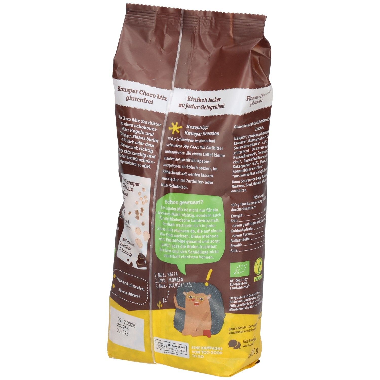 Dos du sachet marron. Texte "KNUSPER Choco Mix glutenfrei". Image d'un hérisson. Logo bio. Texte et informations nutritionnelles.
