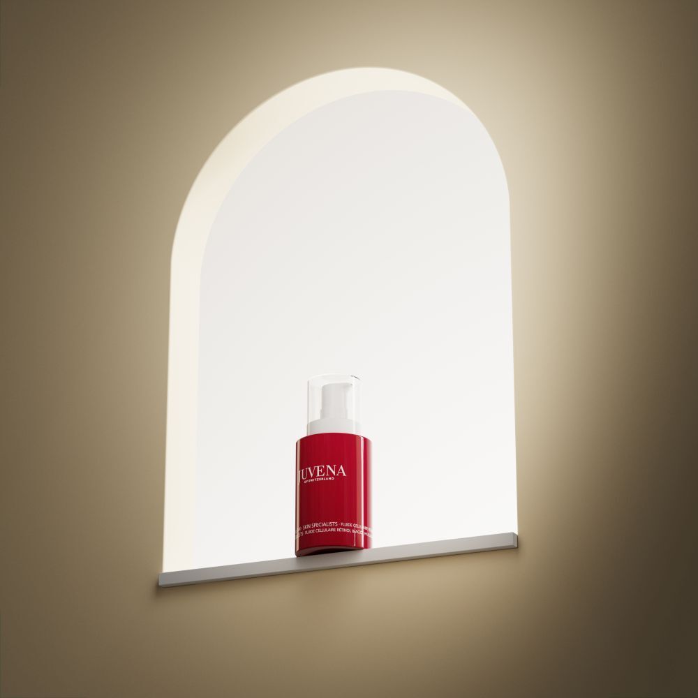 Rote Flasche mit weißem Pumpkopf. Aufschrift: JUVENA. Produkt in einer Nische mit Licht.