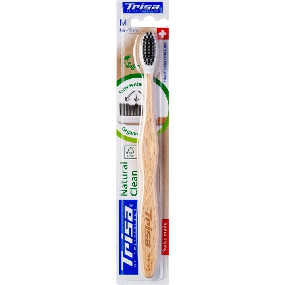TRISA Medium Zahnbürste Natural Clean mit Holzgriff und schwarzen Borsten, verpackt.
