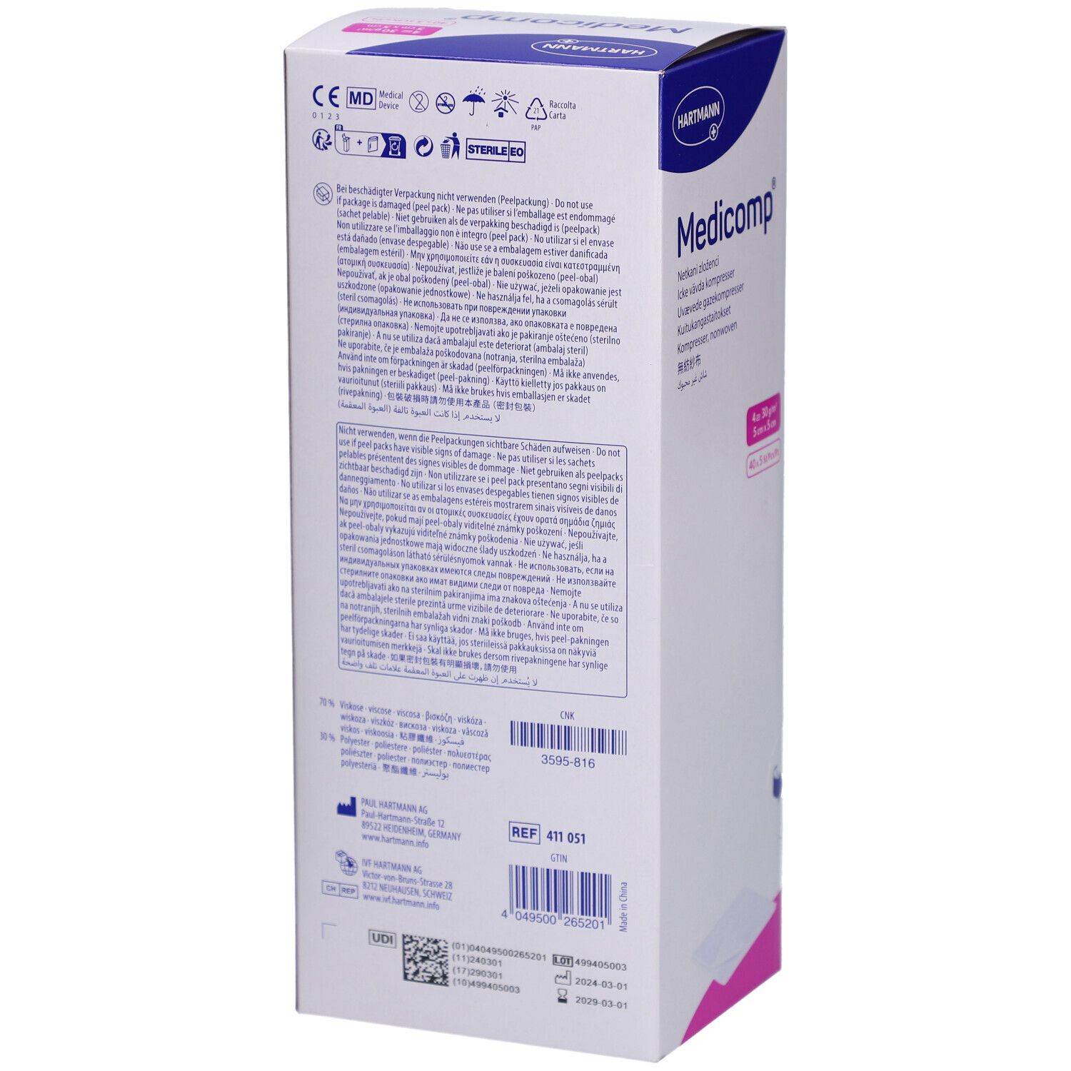 Dos de la boîte de compresses Medicomp. Informations, symboles, références et numéro de lot. Marque HARTMANN.