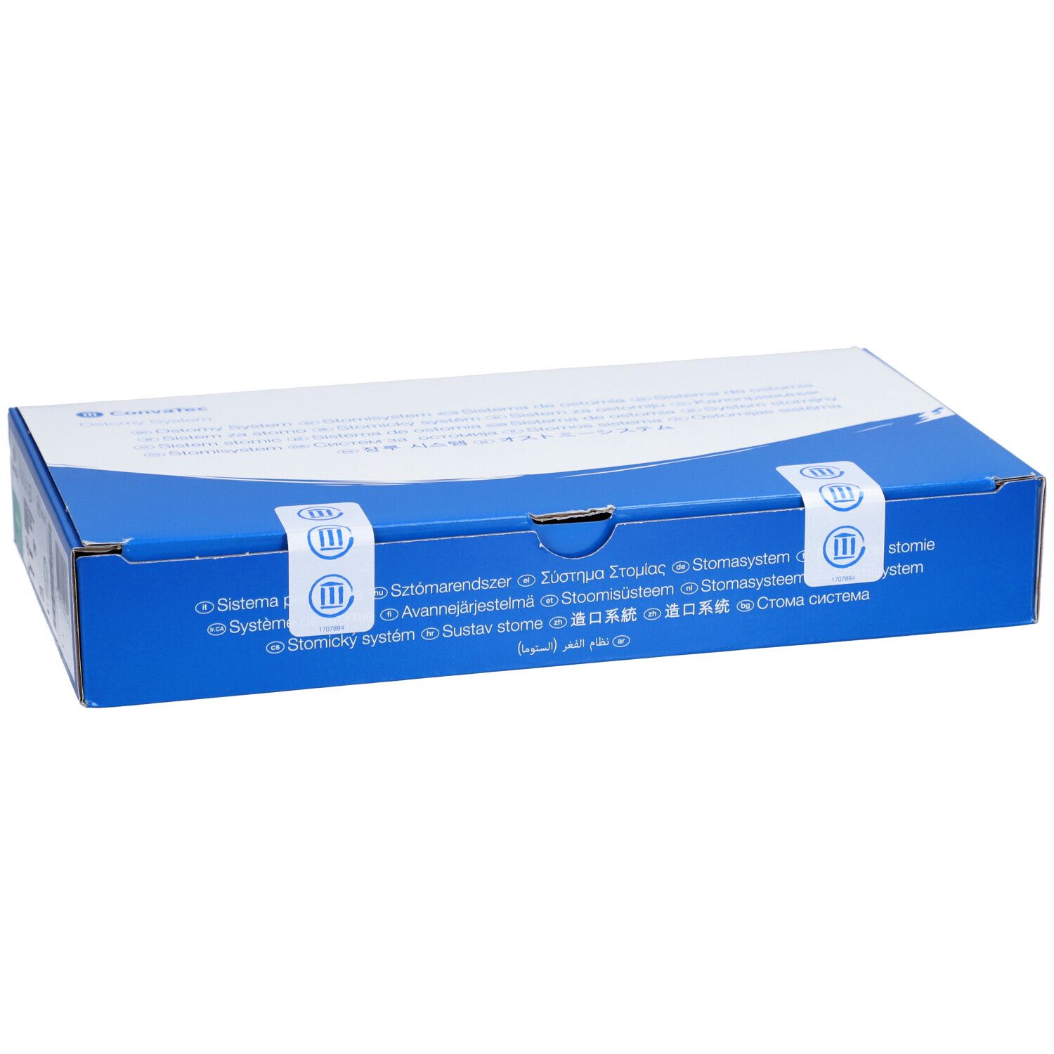 Blaue Produktverpackung mit weißer Oberseite. Text und Logos auf der Oberseite. Zwei weiße Siegel mit Logo.