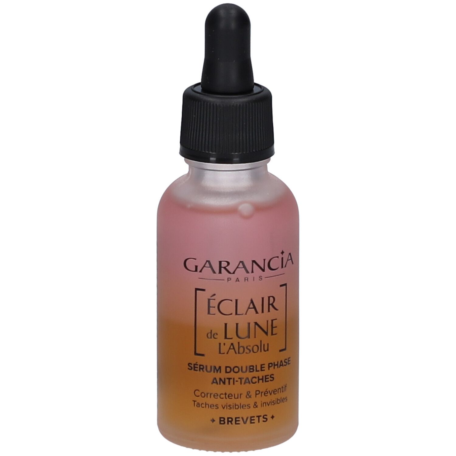 Garancia Serumflasche mit Pipette. Rosa-gelbe Flüssigkeit. Schwarzer Deckel. Text: Éclair de Lune, Anti-Taches.