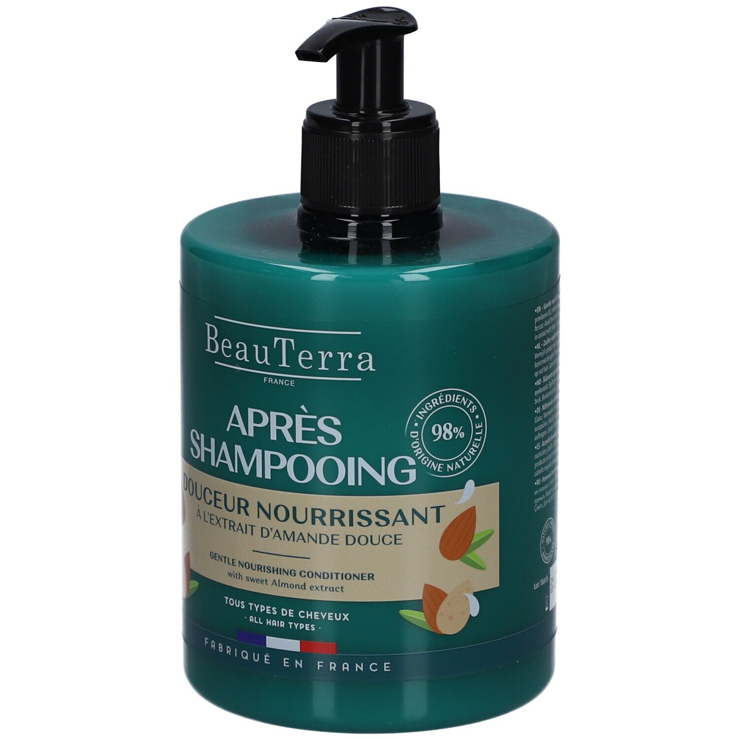 Grüne Flasche mit schwarzem Pumpkopf. Aufschrift: Après Shampooing, Douceur Nourrissant, Extrait d'Amande Douce. 98% Inhaltsstoffe natürlichen Ursprungs.