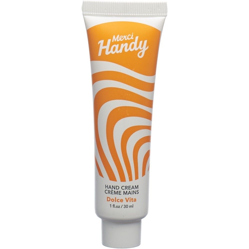 Weiße Tube mit orangefarbenem Design und "Merci Handy"-Logo. "Hand Cream Dolce Vita" steht darunter. 1 fl.oz/30 ml.