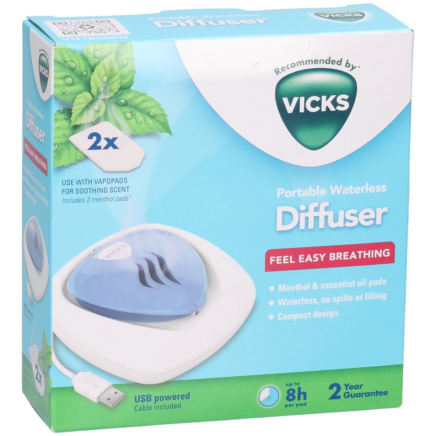 Emballage du diffuseur portable sans eau Vicks. Comprend diffuseur, câble USB et VapoPads. Couleurs bleu et blanc.