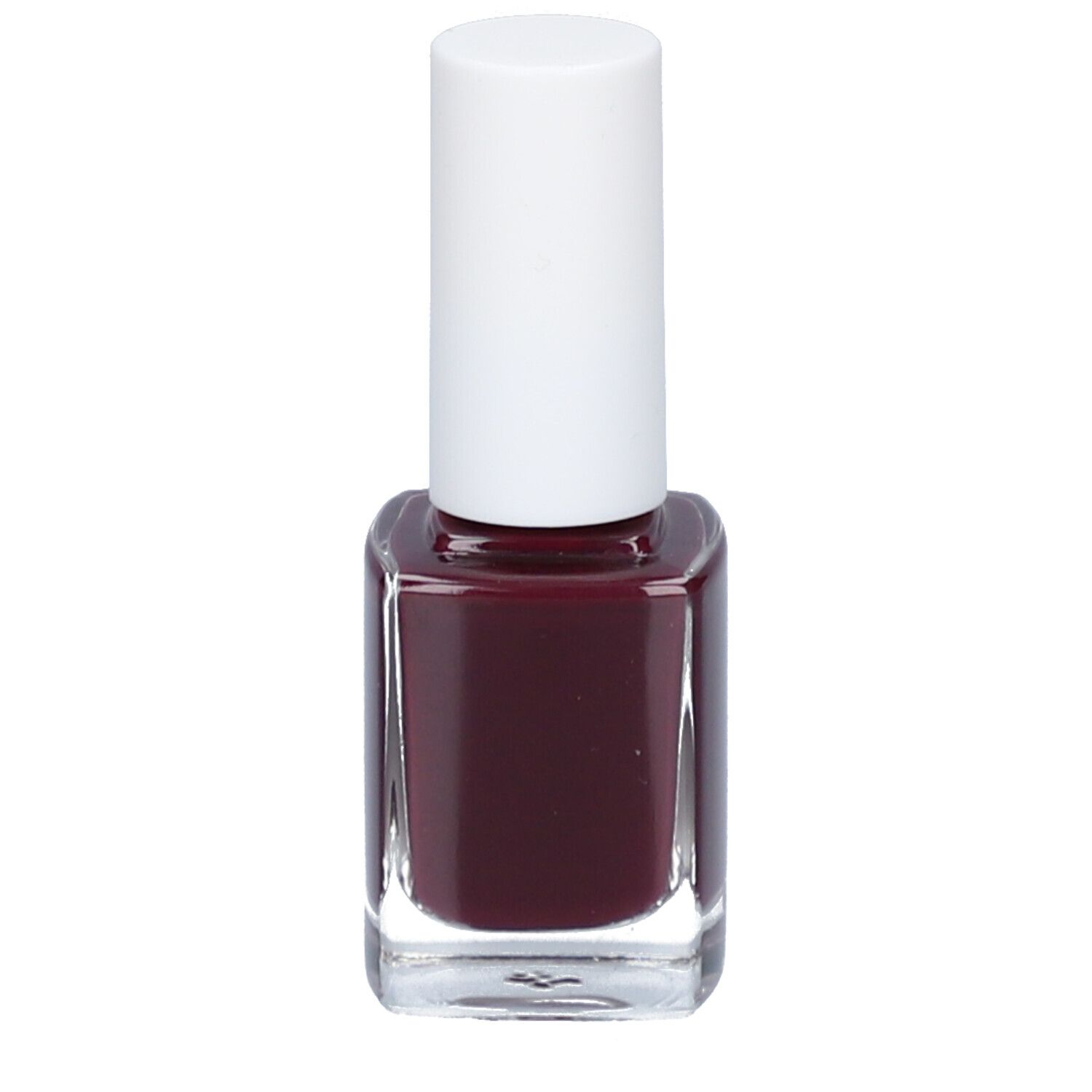 Flacon de vernis à ongles avec bouchon blanc. Vernis rouge foncé dans flacon carré en verre.
